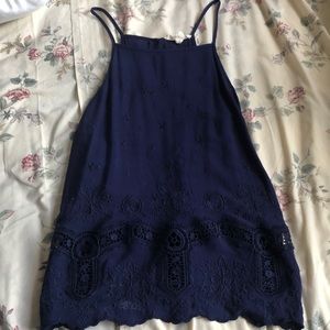 A navy blue loose tank/halter top